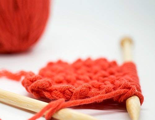 bamboo knitting needles with red wool