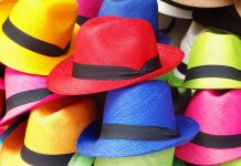 Best Embroidery Machine for Hats – Buyer’s Guide & Reviews colorful hats on a pile